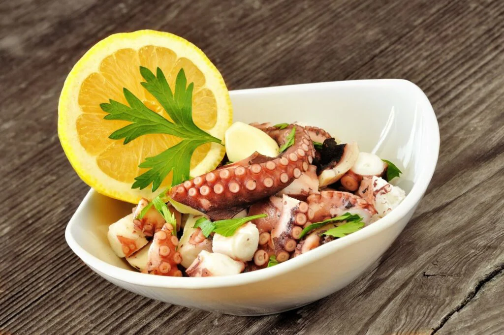 Octopus salad with olive oil, lemon and parsley