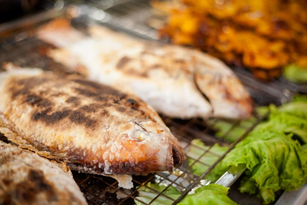 Fresh grilled whole red snapper fish in sea salt