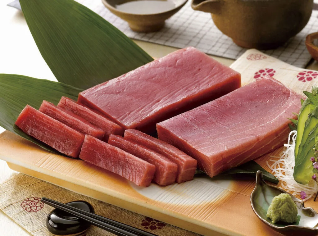  Tuna Steaks and Tuna Saku Blocks on a wooden plate
