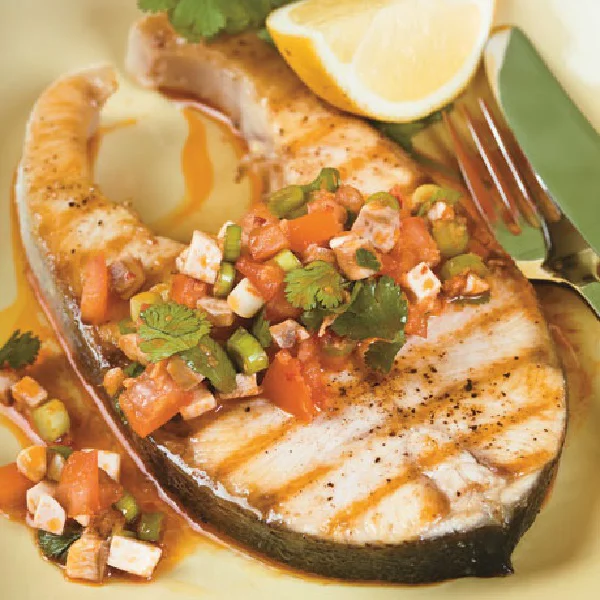 Pacific kingfish steak cooked with salsa on top