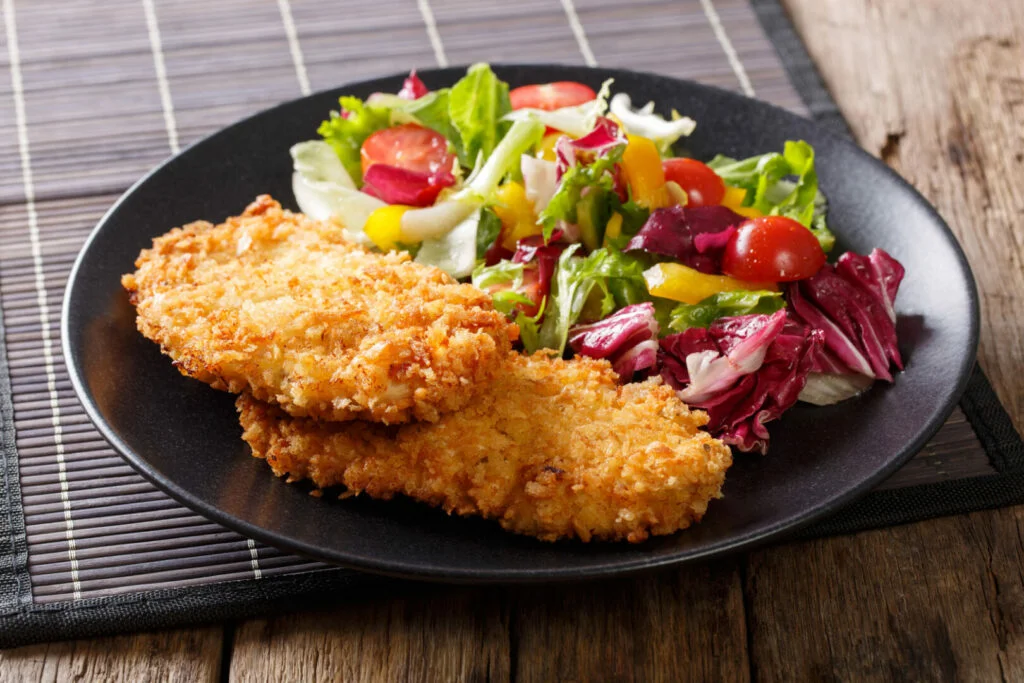 Fried pollock fillet natural and chem free with a salad